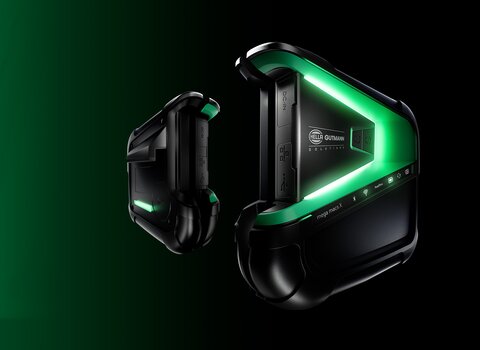The picture is predominantly green with black elements. A car door can be seen on the left-hand side. To the right, the mega macs x from Hella Gutmann hovers in the side view. | © wob AG